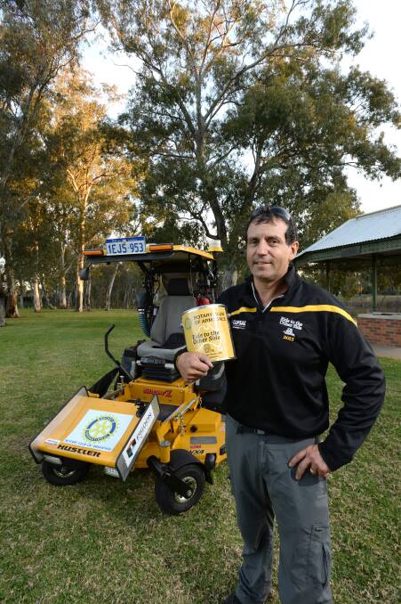DRIVER: Craig Alford is riding his mower across Australia. Picture: JIM ALDERSEY