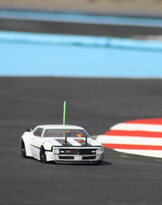 CRUISING: A car on the track.