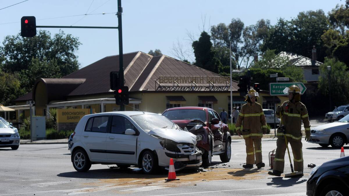 ACCIDENT: CFA crews clean the intersection at Don and High streets last night. Picture: JODIE DONNELLAN