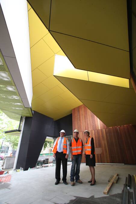 Mayor Cr Barry Lyons, Site Manager Adrian Hall, Marg Allan, Director Organisation Support and Project Director. Bendigo Library. Picture: PETER WEAVING