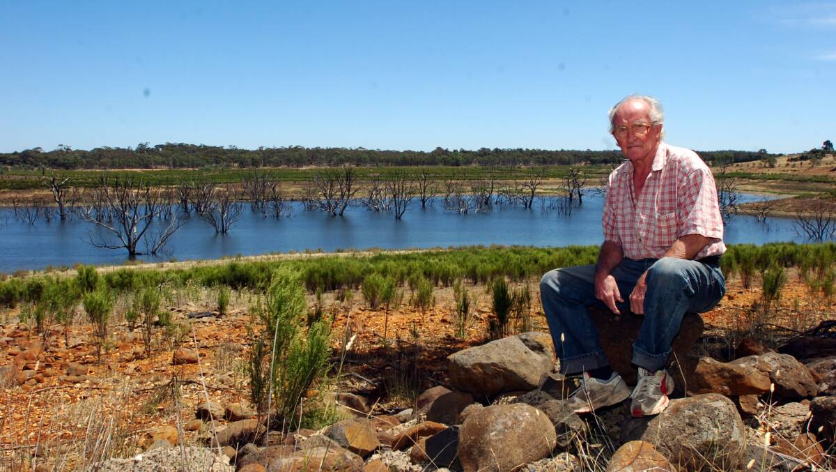 John Davison sits beside where the Campaspe River comes out of Lake Eppalock.
pic by Andrew perryman on Fri 13th Jan 2006.
