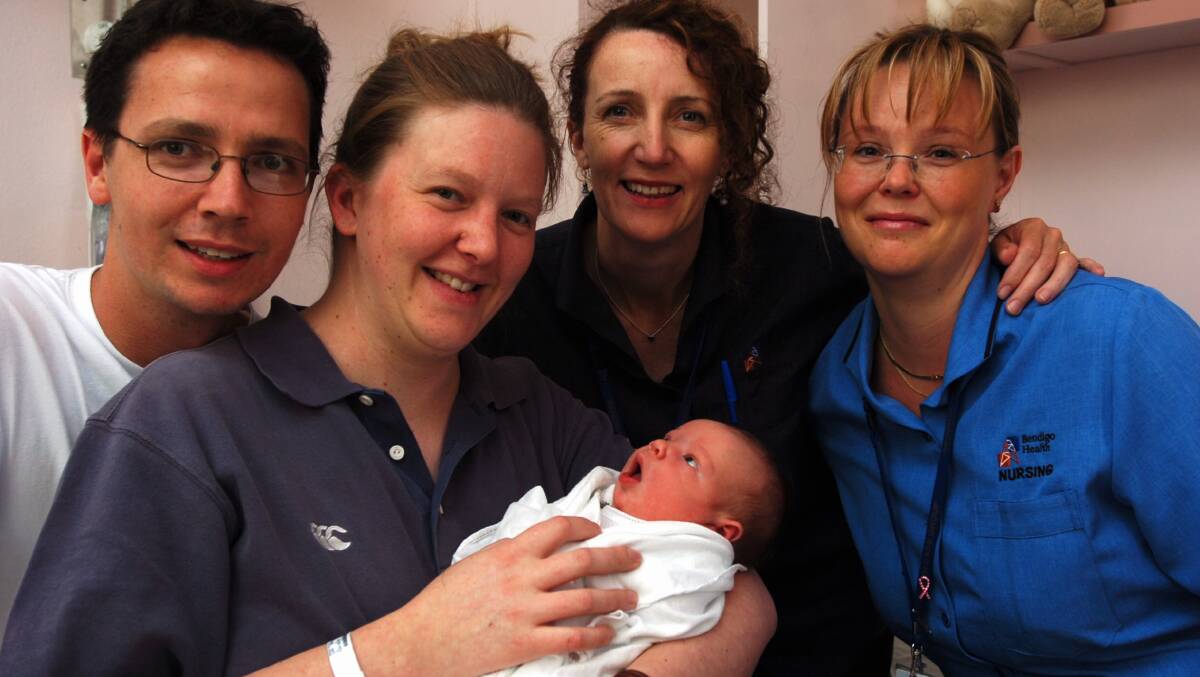 Mark and Prue Winter with new baby Anna-Kate and Midwives at the Bendigo Health Care Cate Creely and Anna-Leena Percival.
pic by Andrew Perryman on Tue 10th Jan 2005.