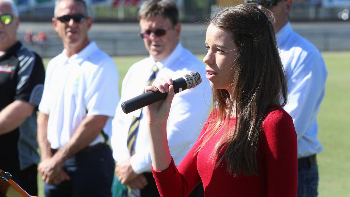 Claire Synan sings the national anthem, opening ceremony at the Queen Elizabeth Oval. Picture: PETER WEAVING