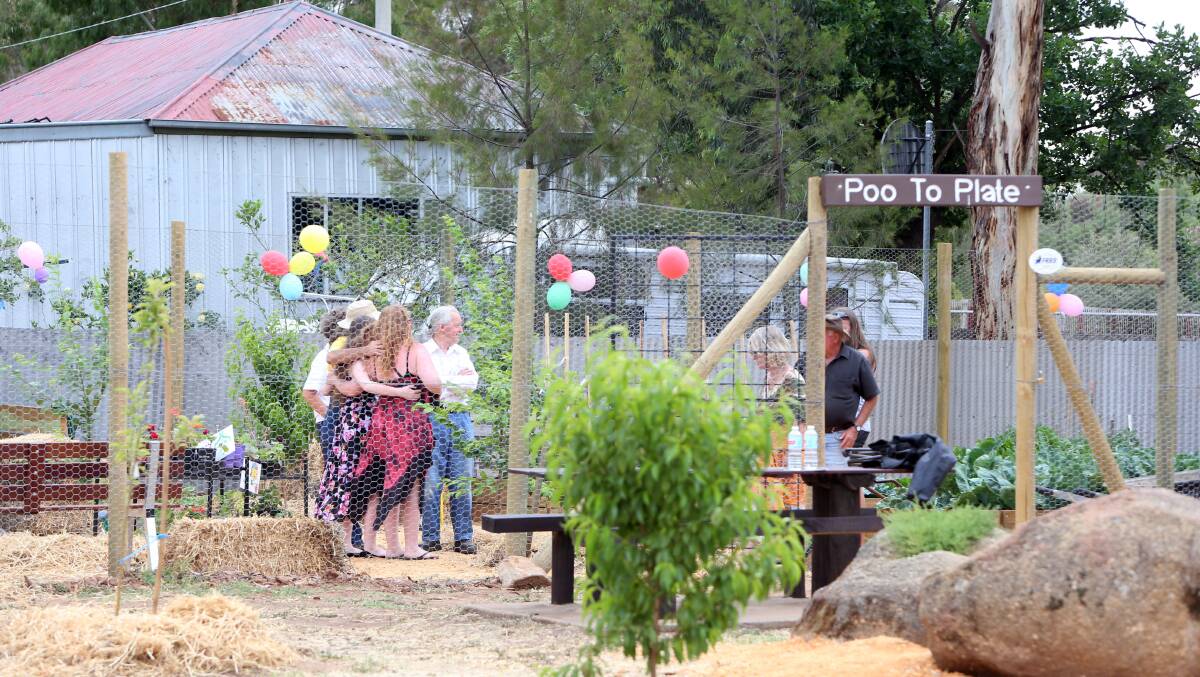 People exploring the community gardens.

Picture: LIZ FLEMING