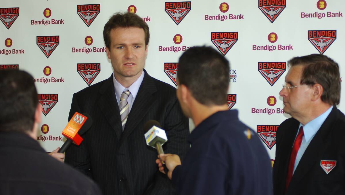 New Bendigo Bombers General Manager, Matthew Allan answering questions from media with Chairman, Warren Driscoll (looking on), at the announcement of his appointment
pic by Bill Conroy 25/10/05