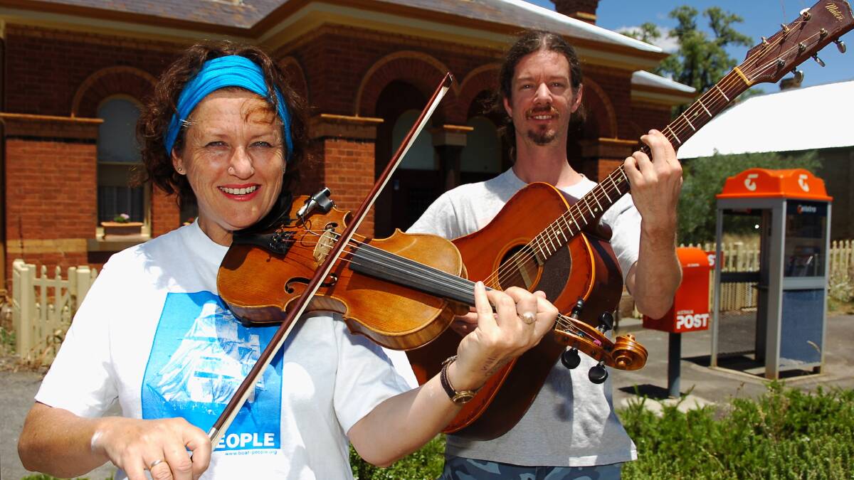Promo for Folk Festival - Jan Palethorpe & Bruce Armstrong in front of the Post Office in Chewton.
pic ; LAURA SCOTT.
12.01.06