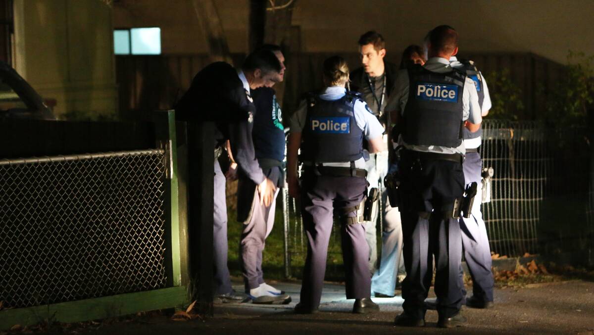 One police escapee found hiding in a residence in  Honeysuckle Street. Pictures: Peter Weaving 010713