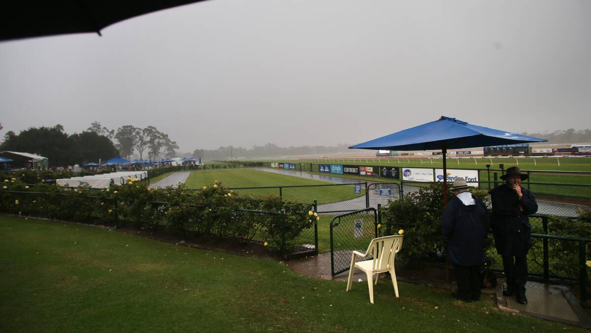 Yalumba Golden Mile crowd raced for cover when a thunderstorm broke.
Picture: PETER WEAVING