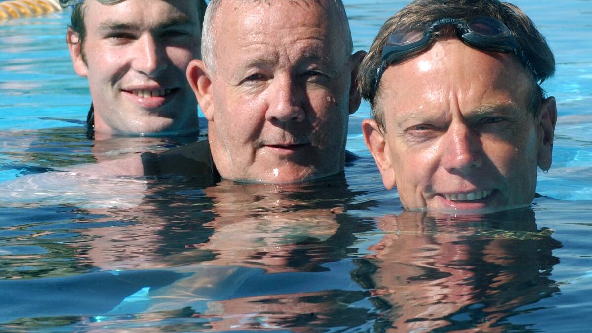 Simon Brown, Mick Ellis, Peter Webster
all to participate in the Pier to Pub swim at Lorne
Pic Brendan McCarthy 060106