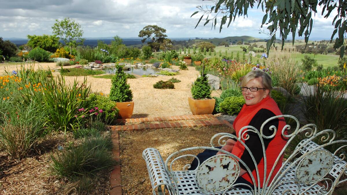 Claire McKellar is opening her garden as part of Castlemaine's Festival of Gardens.
pic ; LAURA SCOTT. 27.10.05