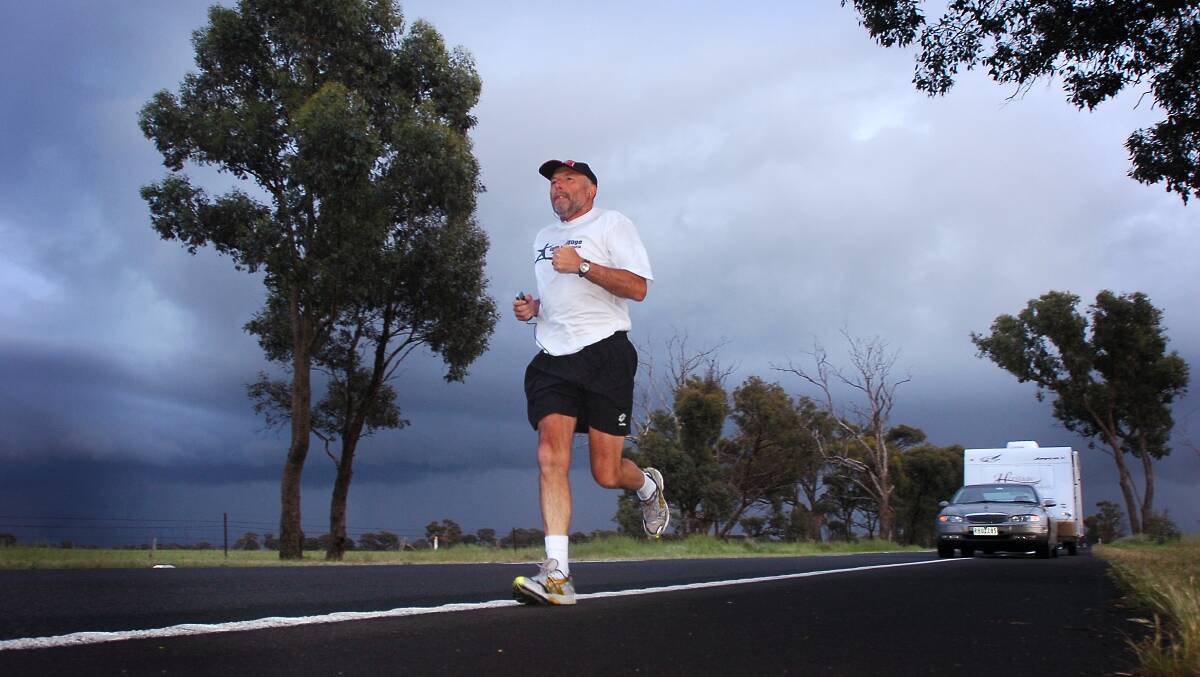 Richard Warner is running from Adelaide to Melbourne. This picture was taken about 3kms from Marong on the Calder Hwy ( as if you would be heading towards Bridgewater )
pic by Andrew Perryman on Mon 24th Oct 2005.