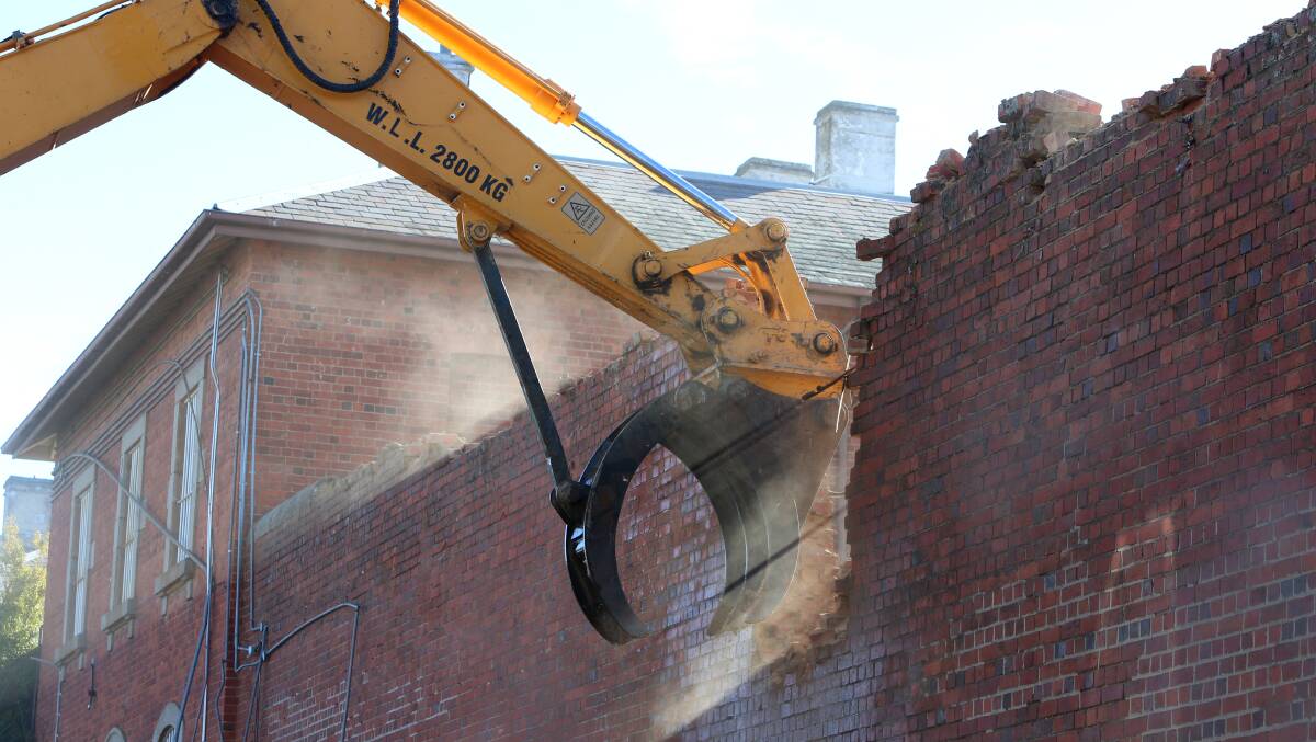 Old Bendigo Gaol wall is demolished for redevolepment.
Picture: Peter Weaving
240613