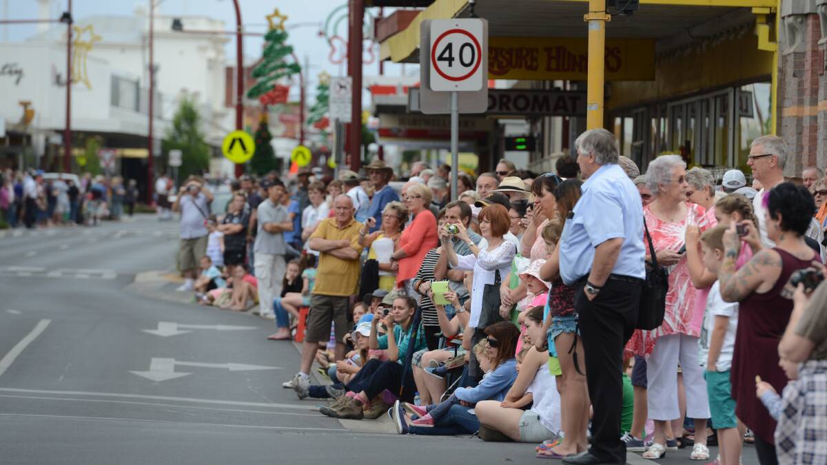 Many people gathered by the roadside to watch the procession.

Picture: JIM ALDERSEY