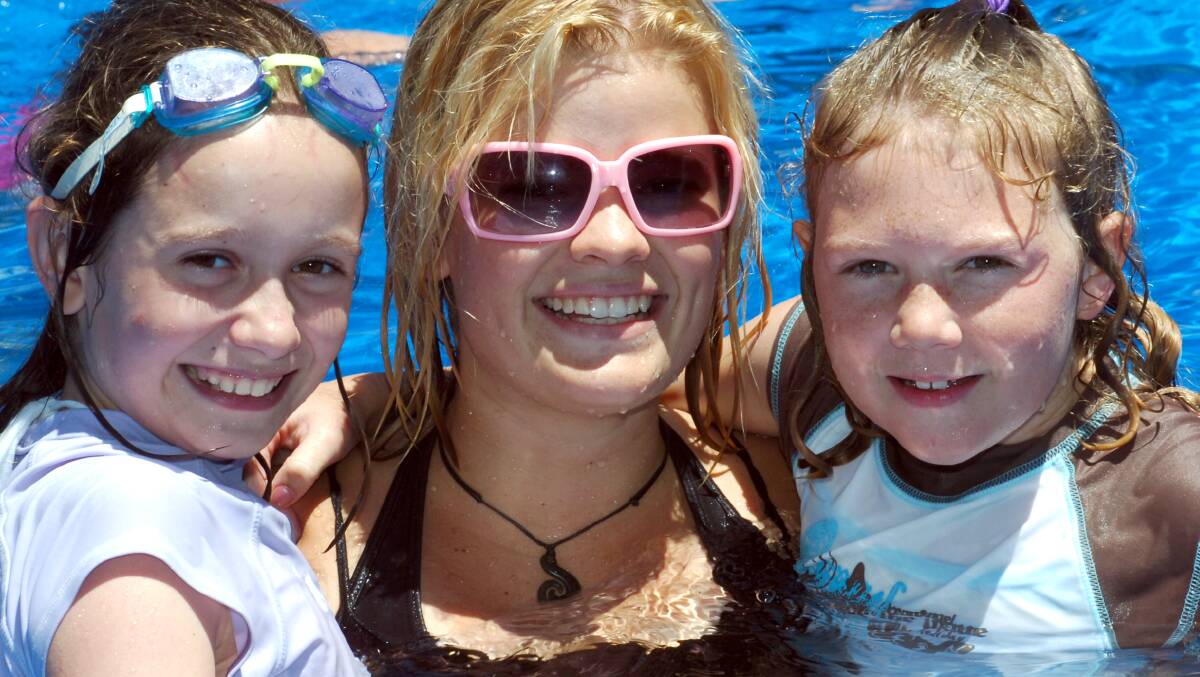 YWCA Leader Beth Batchelor with Ebonie Brennan and Louise Freeman at the White Hills pool. Picture ; PETER HYETT.