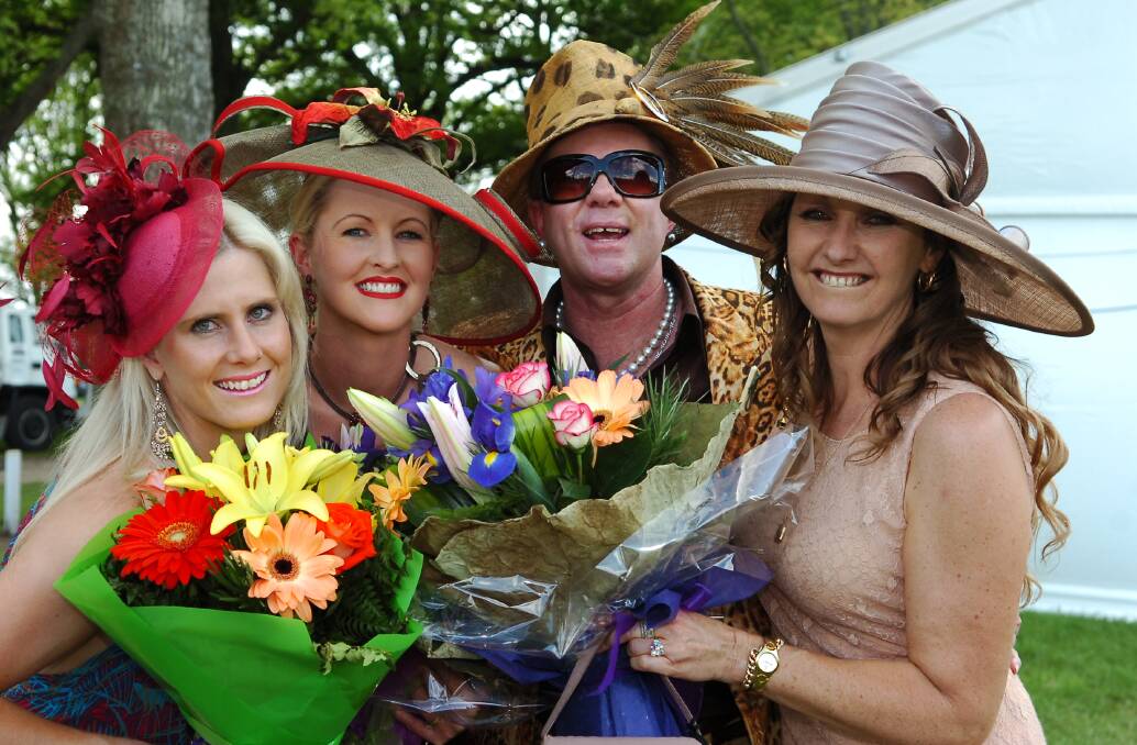 Kyneton Cup 2005.  Fashion on The Field Winners.
l-r Casey Rawiller (2nd place), Emily Rae (1st), Peter Jago (one of the judges) Therese Sanderson (3rd). Pic Brendan McCarthy 021105