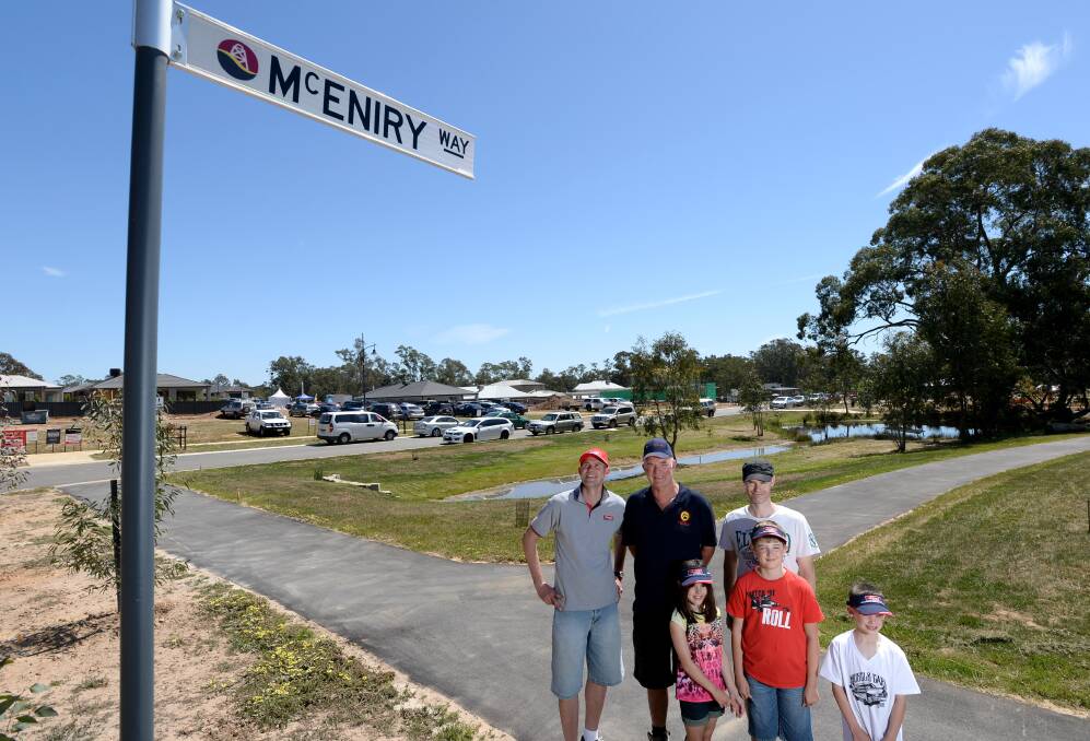 HONOUR: Villawood regioanl general manager Julian Perez with Tony, Chloe, Joel, Ryan and Simon McEniry. The McEniry family have a street named after them in the new  Strathfieldsaye estate. Picture: JIM ALDERSEY