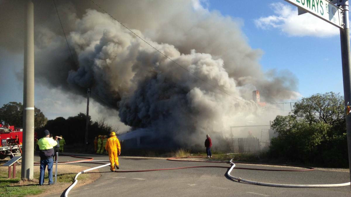 BLAZE: The fire takes hold of the shop in Majorca. Picture: ALASTAIR DOWIE