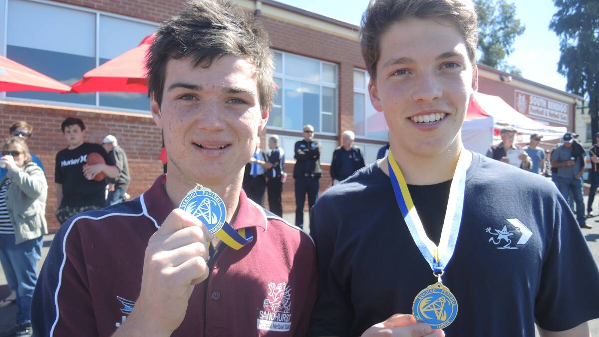 PREMIERS: Victorious Sandhurst under 18s Kyle Chant and Brandon Hodges.