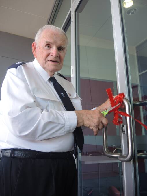 NUMBER ONE SOLDIER: Graham Milne cuts the ribbon.