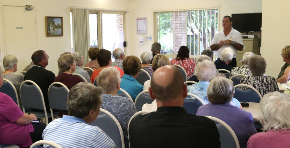 REASSURED: Paul Browne speaks to the residents and investors. Picture: GLENN DANIELS