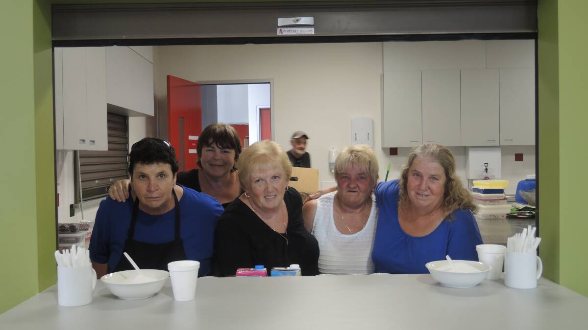 A HELPING HAND: Volunteers Sheayl Apps, Narelle James, Shirley Purcell, Karen Cornwill and Karen Apps.