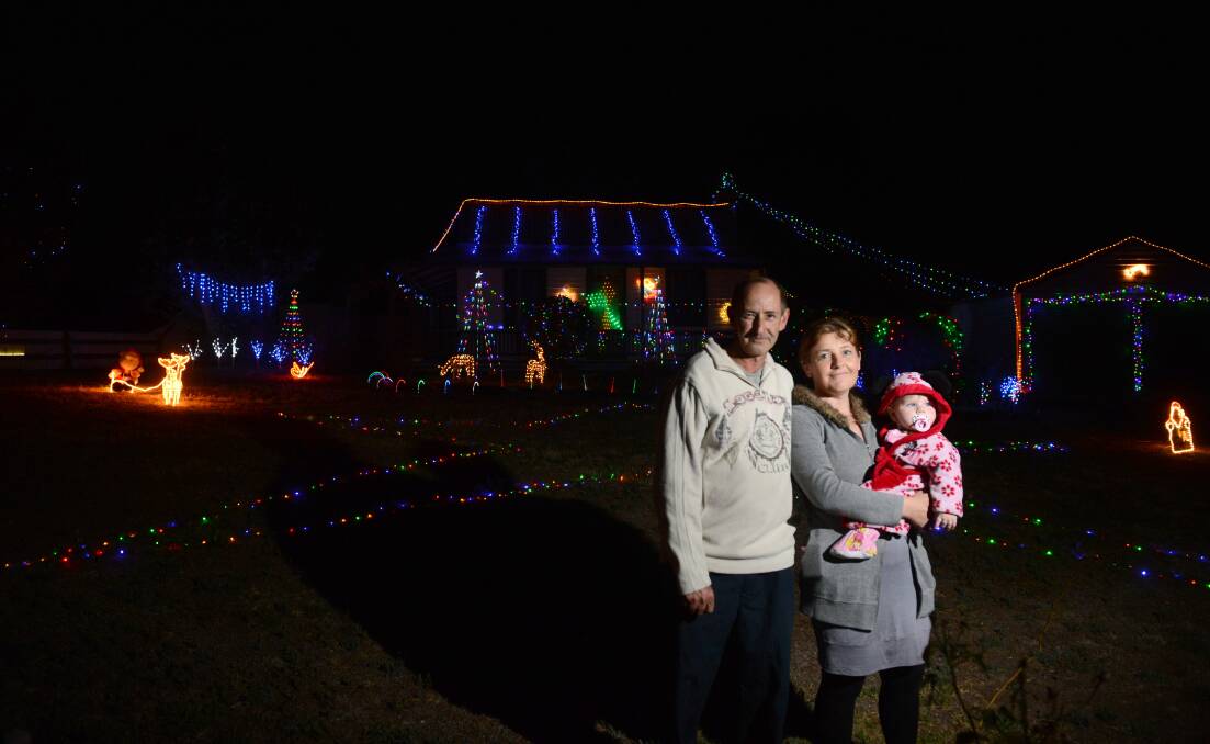 Christmas Lights, Rosemary and Ivan Bailey with Aria Cornish, 1.
Picture: JIM ALDERSEY