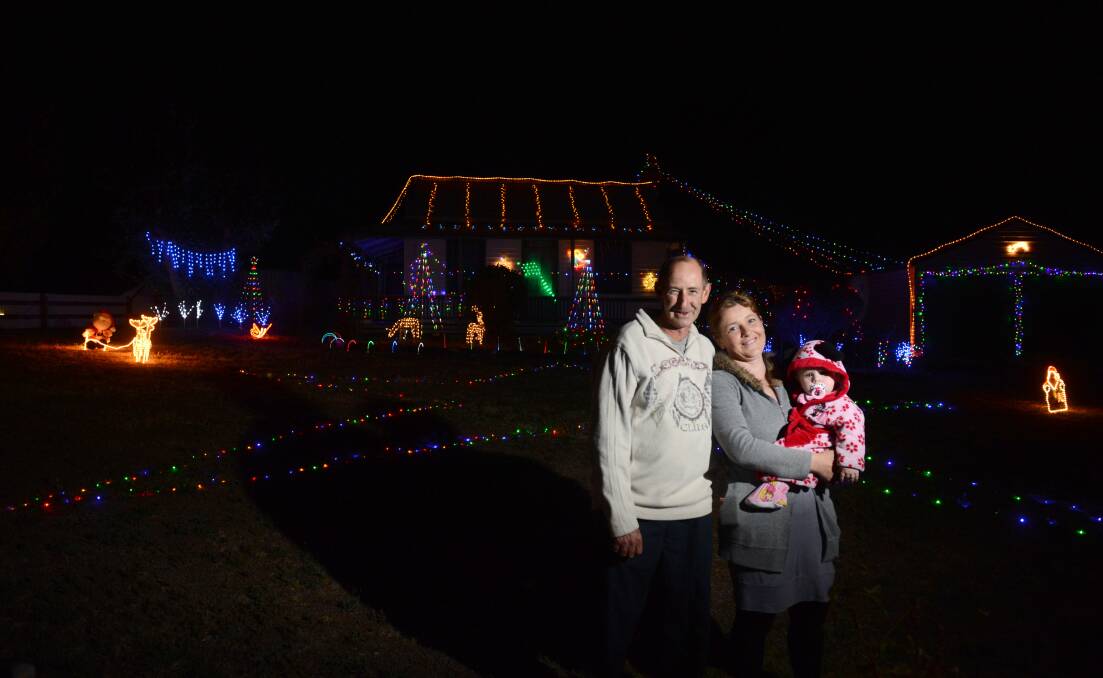 Christmas Lights, Rosemary and Ivan Bailey with Aria Cornish, 1.
Picture: JIM ALDERSEY
