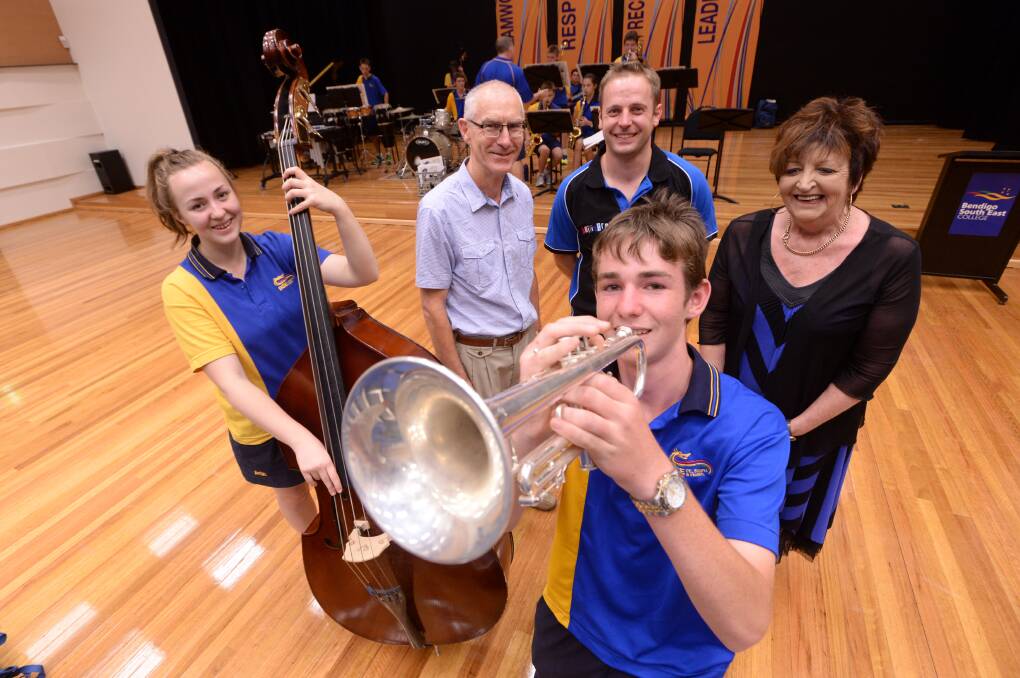 BSE student Thea Morton playing the Double Bass, Bendigo Competitions Society Music Co-ordinator David Castles, BSE Arts area leader Stephen Briggs, Bendigo Competition Society President Fay Thomas and student Colin Humprey playing the Trumpet. Picture: JIM ALDERSEY