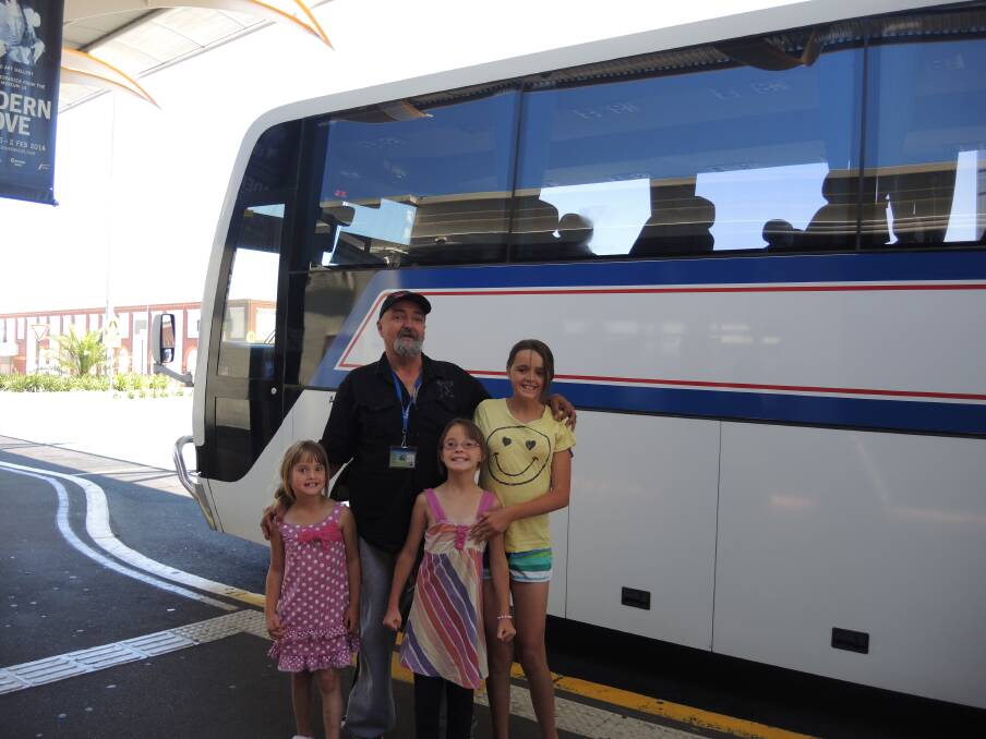 HAPPY TRAVELLERS: Leah, 6, Darren, Kelly, 8, and Karly Hall, 13. Picture: WENDY WILLIAMS.