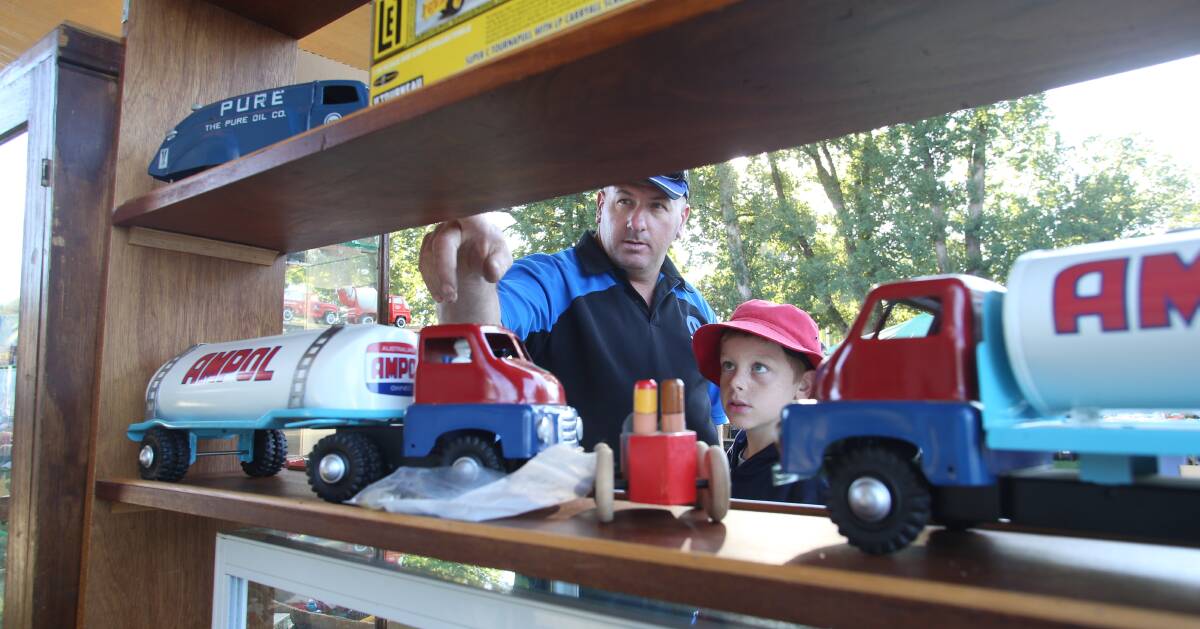 FAMILY FUN: Collector Jason Phillips with his son Brent, 9, from Horsham. Picture: PETER WEAVING