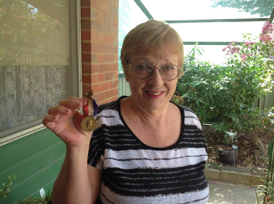 MEMORIES: Margaret Hearps with her medallion.