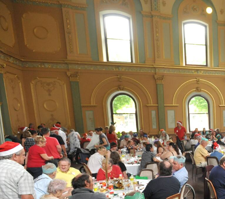 The community Christmas lunch has been a tradition in the town hall.