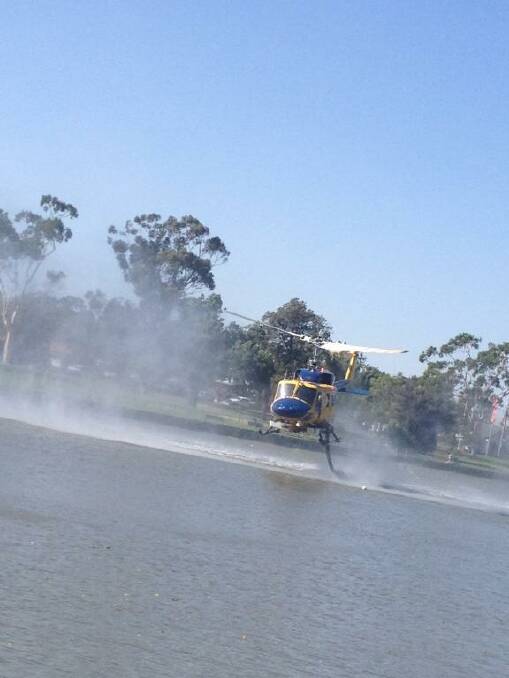 QUICK RESPONSE: The firefighting helicopter has made several trips to Lake Weeroona this morning. PICTURE: Supplied.
