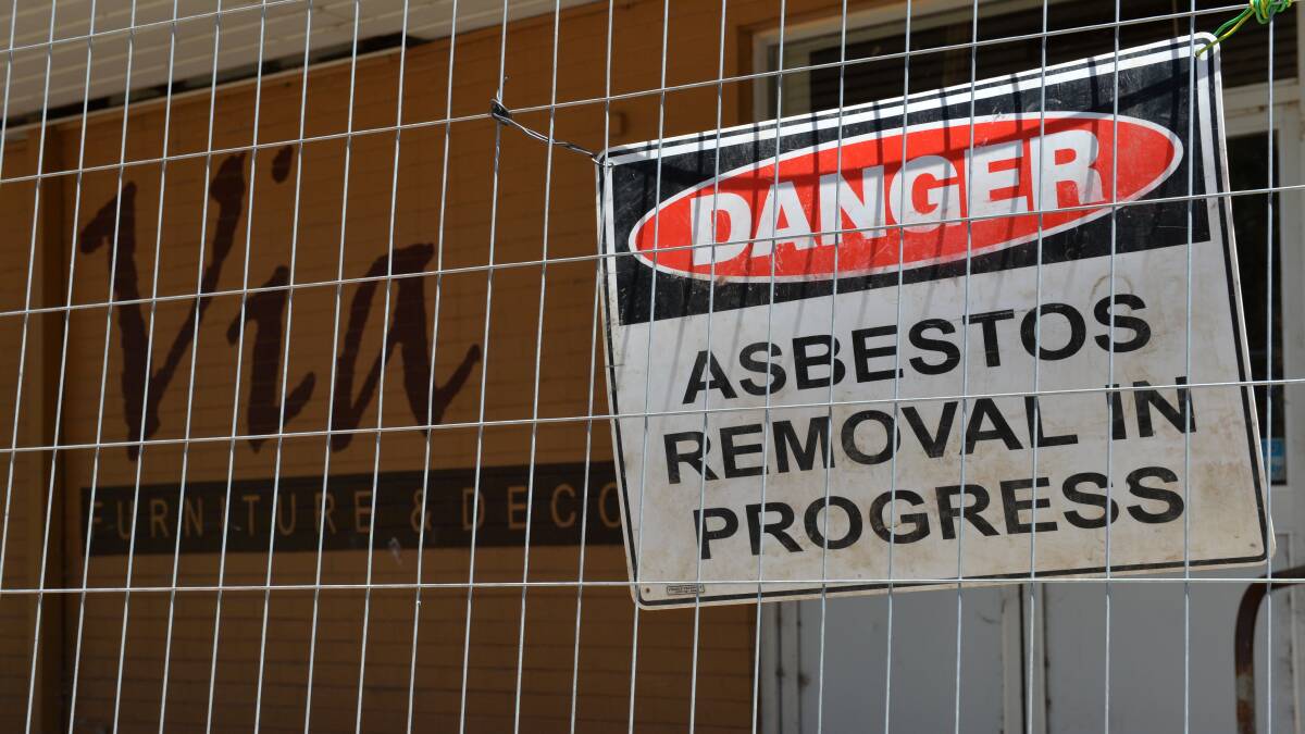 DEMOLITION: Asbestos is being removed from the site.