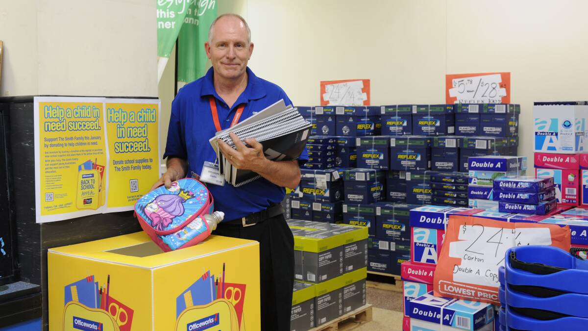 DONATION: Officeworks store manager Colin Gillies with products for disadvantaged young people.