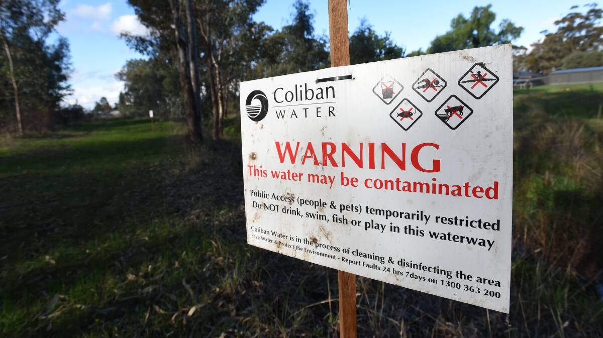SPILL:  A warning at California Gully Creek after sewerage was released into the waterway. Picture: JODIE DONNELLAN