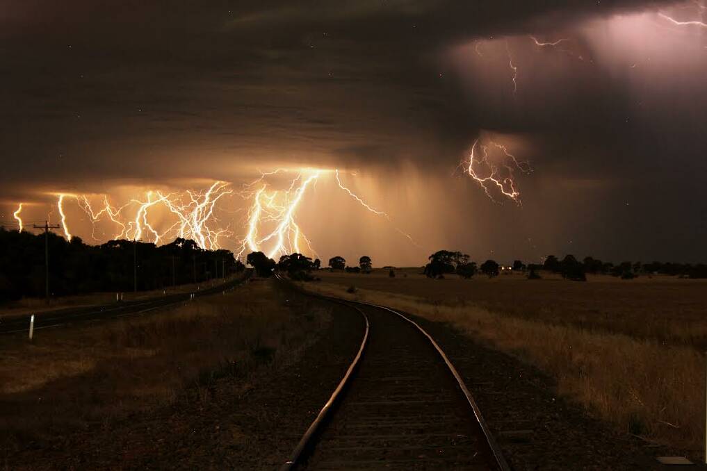 LIGHTNING CRASHES: Kylie Epskamp captured multiple lightning strikes near a railway line