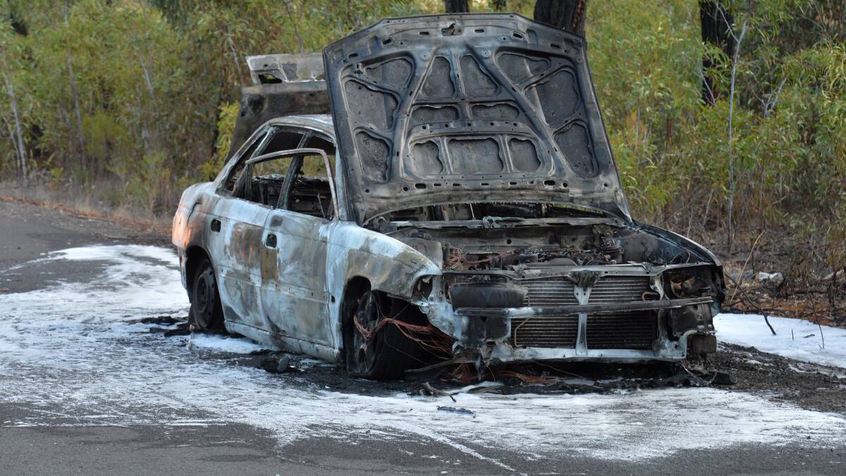 BURNT: The destroyed Subaru. Picture: BLAIR THOMSON