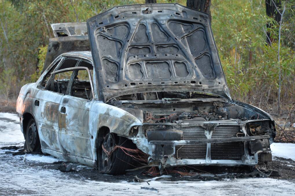 BURNT: The destroyed Subaru. Picture: BLAIR THOMSON