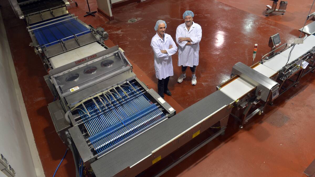 INVESTMENT: Eagle Foods plant manager Steve Mallia with general manager Charles Barton. Picture: BRENDAN McCARTHY