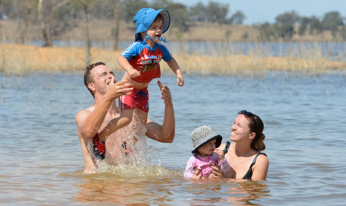 POSITIVE: Lake Eppalock is tipped to be busy this season. Pictured is the Harrison family enjoying the lake.