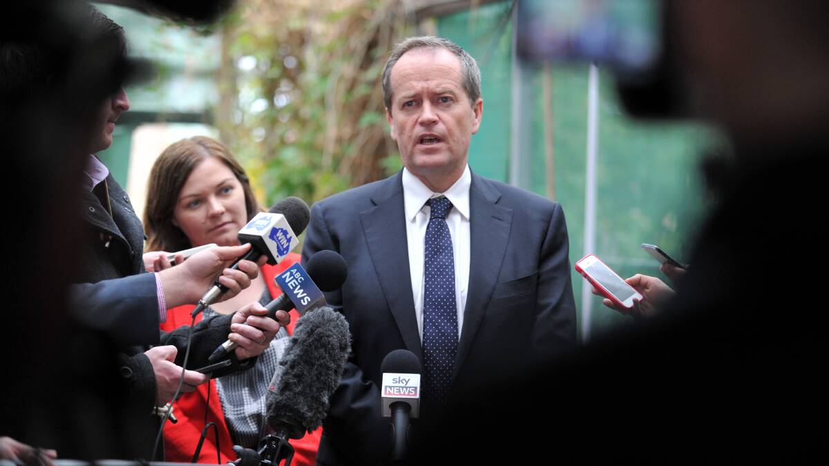 TALKS: Bill Shorten, pictured with Lisa Chesters, fields questions at a pensioner's home in Bendigo on Tuesday. Pictures: JODIE DONNELLAN