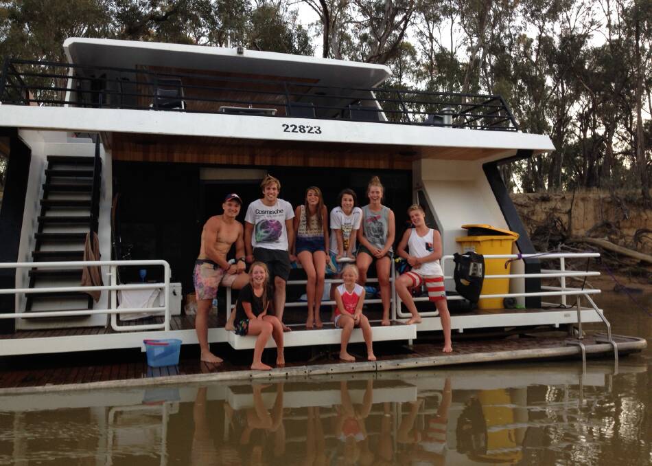 Jane Wines sent us this photo of the Wines, Eishold and Viney families enjoying New Year's Eve on the Murray River.