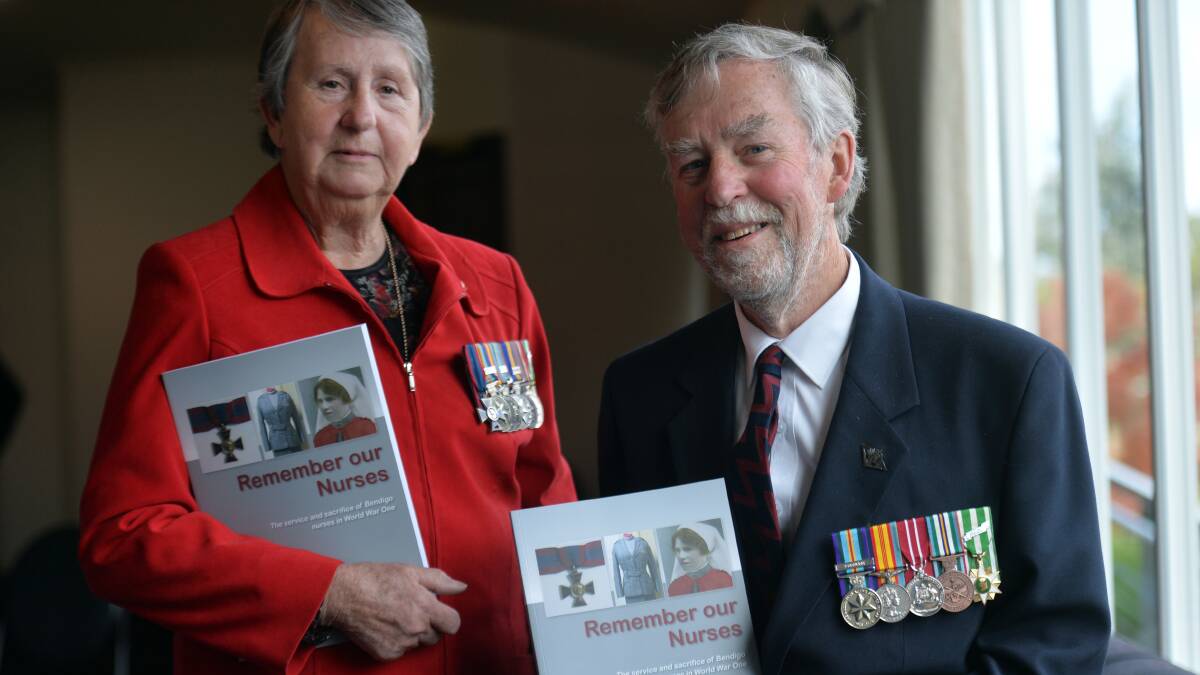 HISTORY: Historian Murray Poustie with Returned Nurses RSL sub-branch president Colonel Jan McCarthy at the book launch. Picture: BRENDAN McCARTHY