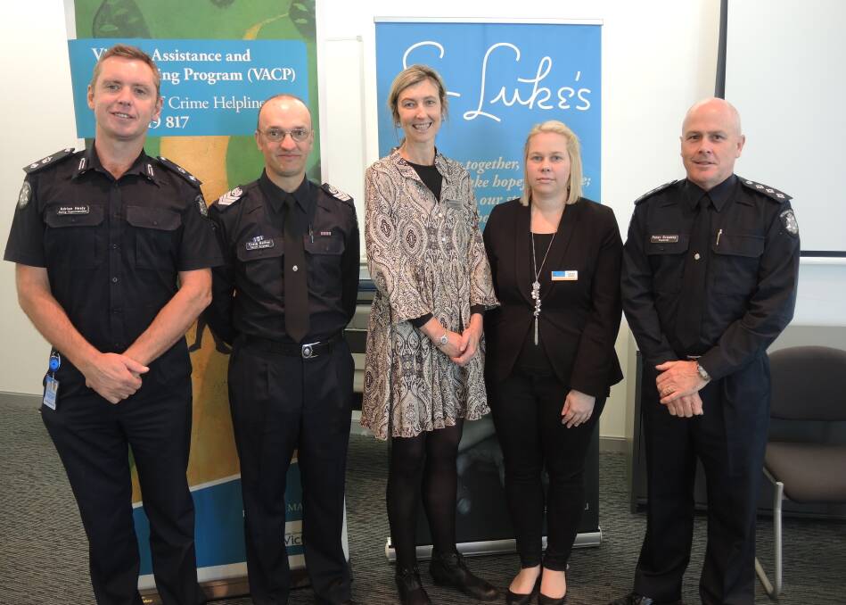 PARTNERSHIP: Acting Superintendent Adrian Healy, Senior Sergeant Craig Gaffee, Department of Justice executive Jodi Henderson, St Luke's manager of counselling Tracey Grinter and Inspector Peter Greaney. 