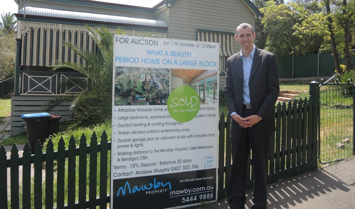 SOLD: Andrew Murphy of Mawby Property outside a recently sold property in Grattan Street, North Bendigo. 