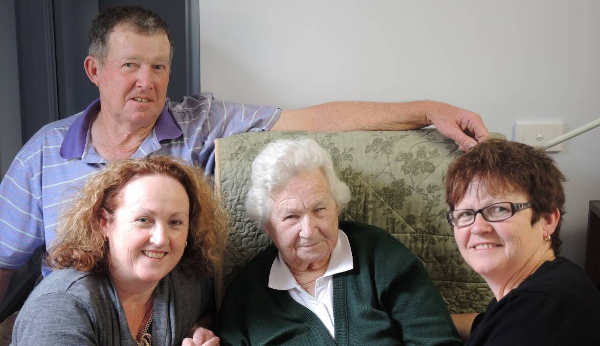 FAMILY: Dorothy Robertson, 90, with three of her 15 children; Kerry, Trish and Barbara.  Picture: ANDI YU