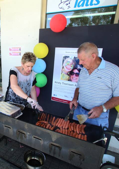 COOKING: Amanda Gallagher and Doug White. Picture: PETER WEAVING