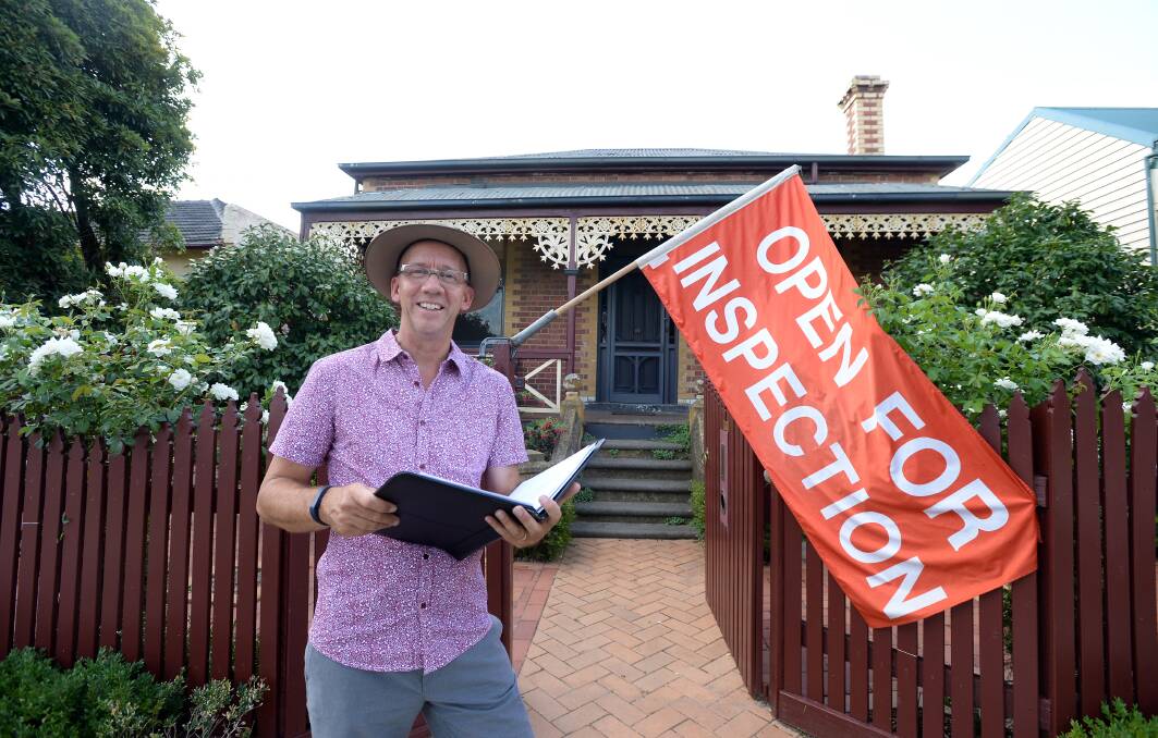 OPEN: Real Estate agent Doug Lougoon at an inspection on Saturday. Picture: JIM ALDERSEY