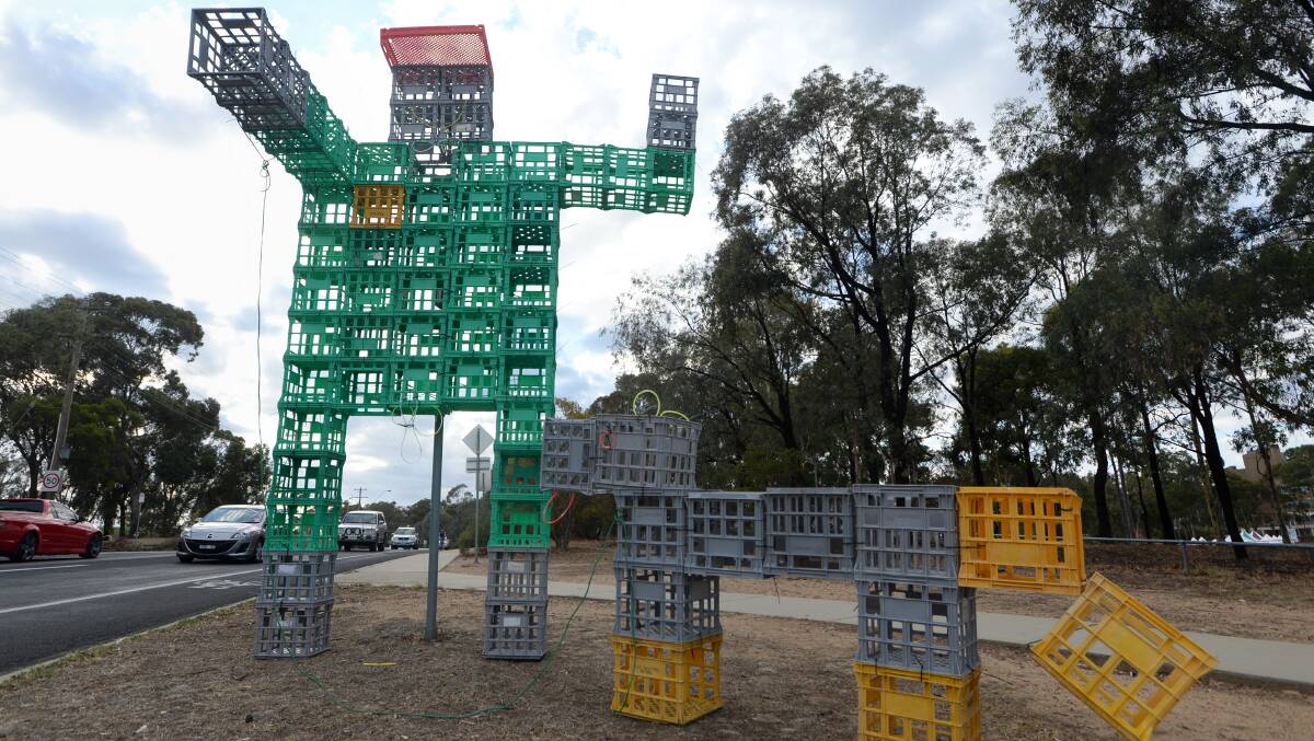 CRATE MAN: Spotted in February near Latrobe University on Ellis St, Flora Hill with his dog. Picture: JIM ALDERSEY
